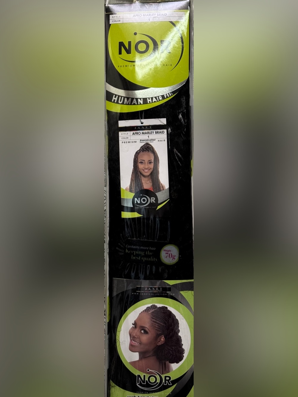 Janet collection. Noir premium synthetic hair. Afro Marley braid.